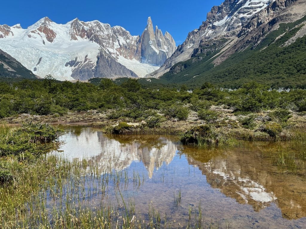 Cerros Torres peak, reflected in water