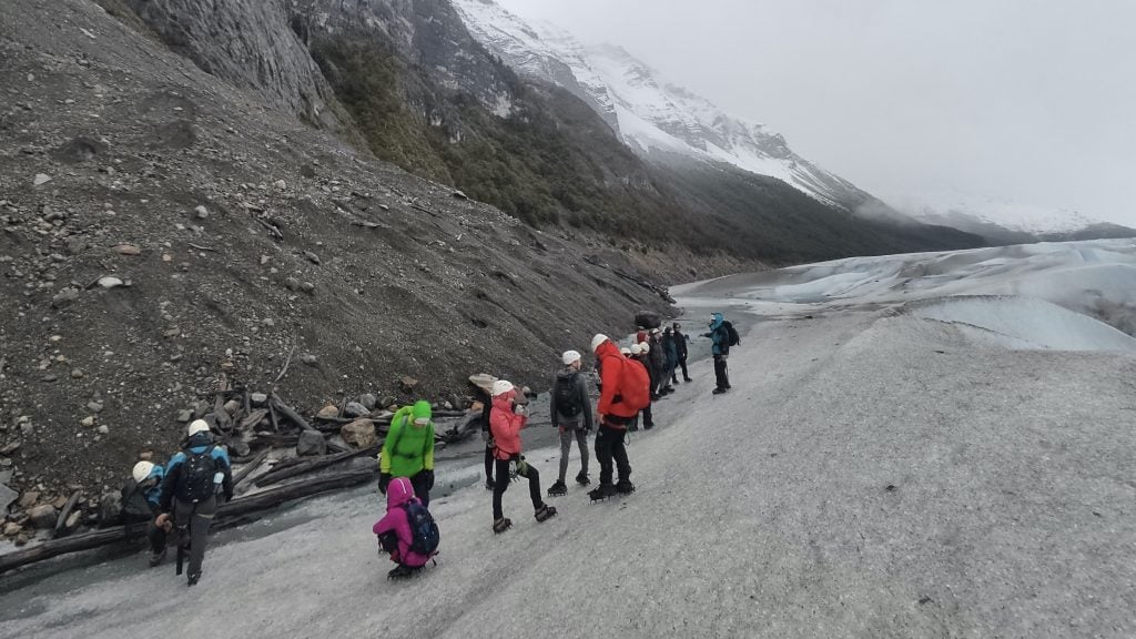 Hikers getting ready to walk on the ice at Perito Moreno glacier in Los Glaciares