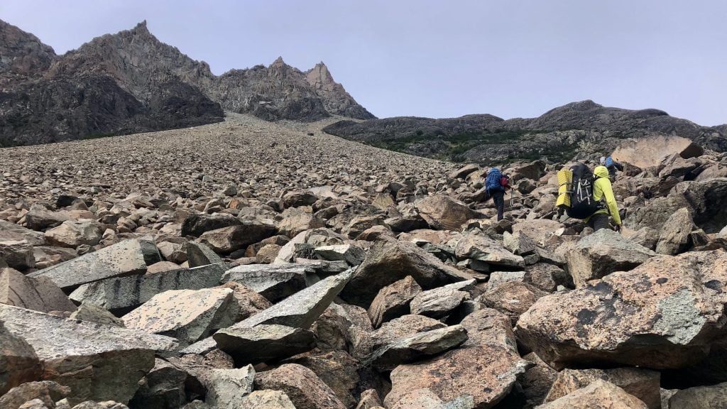 Hikers on a boulder field in Los Glaciares