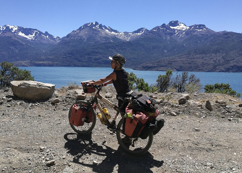 Bamboo bike and cyclist at Lago General Carrera in Chile