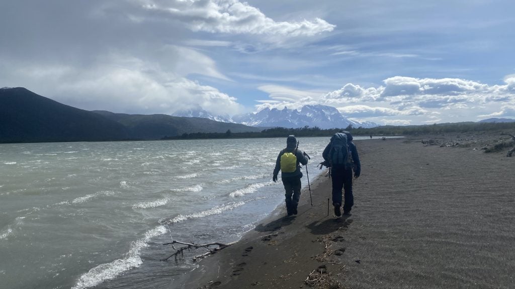 Hiking along Brush Lake with a view of the Torres del Paine massif