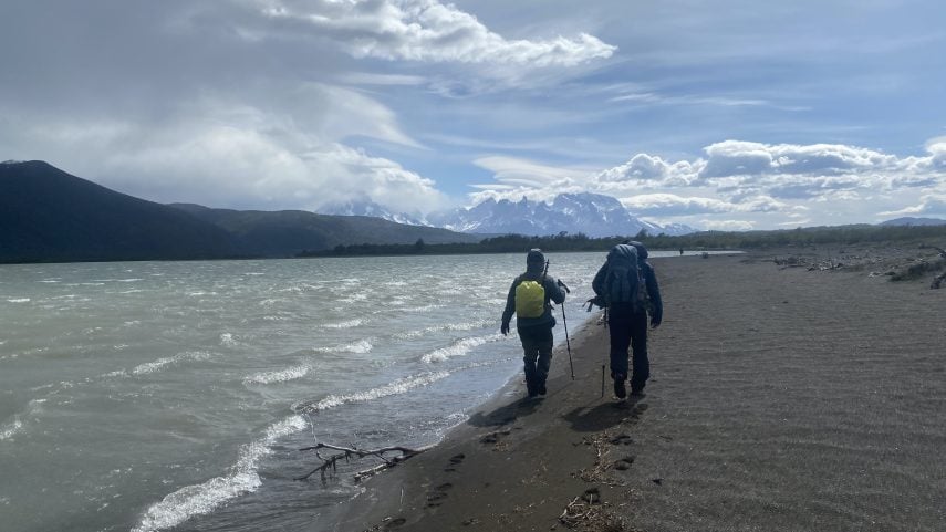 Hiking along Brush Lake with a view of the Torres del Paine massif