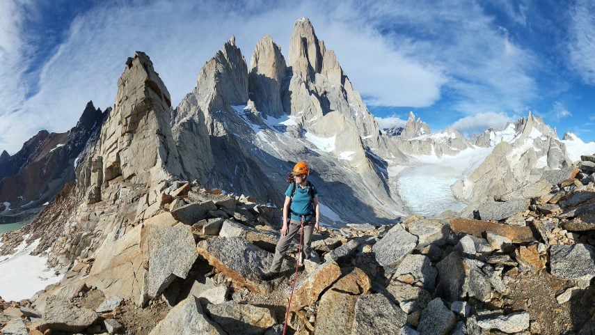 Hiker enjoying the view over the FitzRoy mountain range from Paso Cuadrado in Los Glaciares National Parl